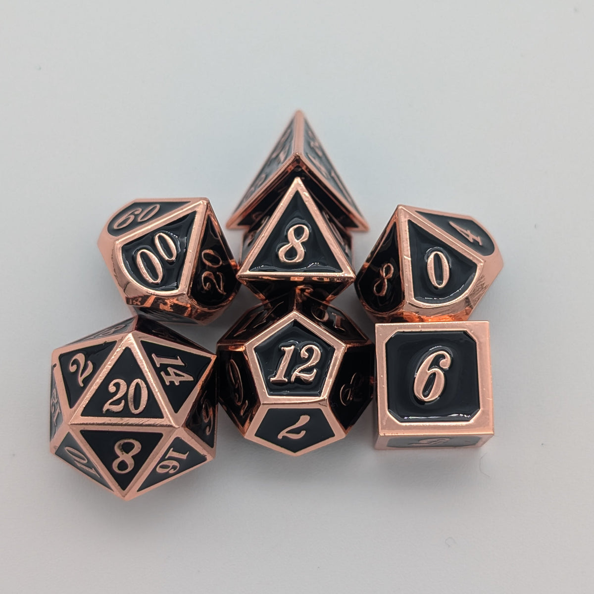 Simple Black and Copper Metal Core Dice Set
