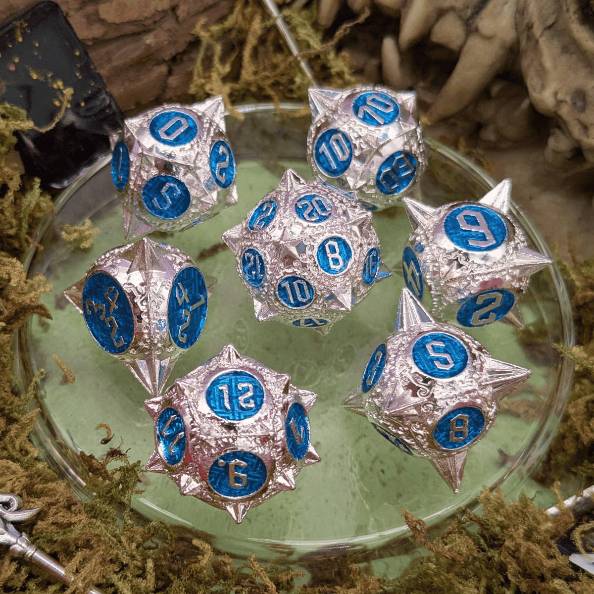 Caltrops Silver and Blue Metal Core Dice Set