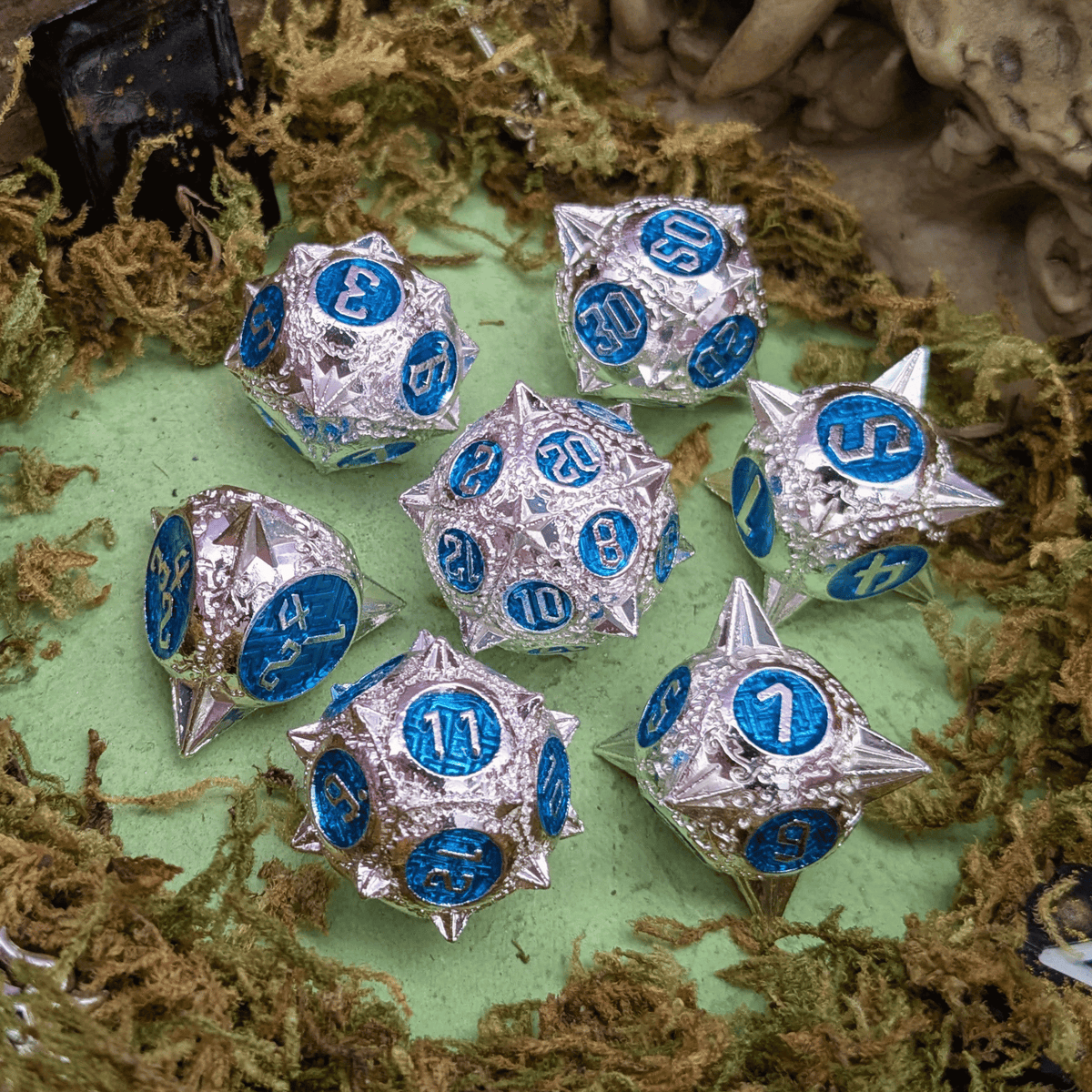 Caltrops Silver and Blue Metal Core Dice Set